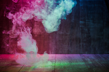 smoke isolated on colorful wooden background