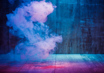 smoke isolated on colorful wooden background