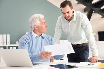 Office employees having argument at workplace