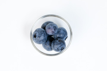 Blueberry in a bowl on white background