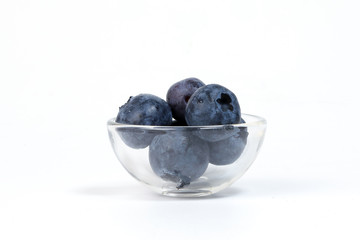 Blueberry in a bowl on white background