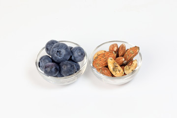 Blueberry Herb Spice Almond Cashew Nut in glass bowl on white background