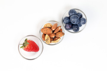 Blueberry Herb Spice Almond Cashew Nut in glass bowl on white background