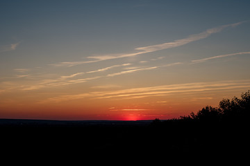 Fototapeta na wymiar Dramatic sunset against nature