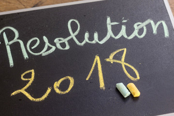 handwriting resolution with chalk and 2018 on chalkboard
