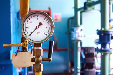 The pressure gauge for pressure shows zero. Abstract background.