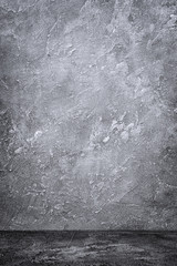 Dark gray grunge concrete textured wall and floor