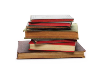 Stack of old antique big books isolated on white background