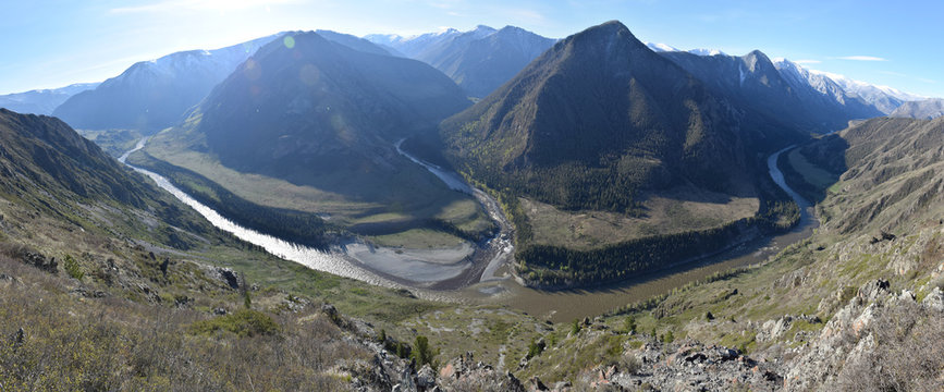 A panorama of mountain rivers merging viewed from high above