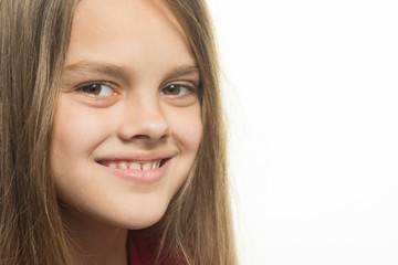 Close-up portrait of a smiling teenage girl