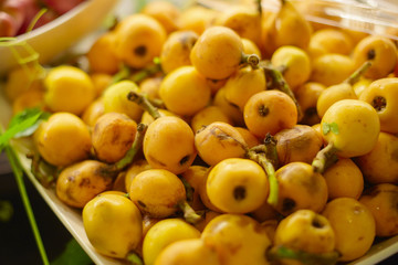 ripe medlar on a plate