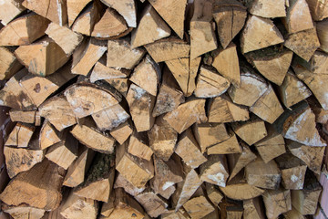 Texture of the firewood. Stacked woodpile.