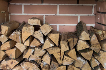 Texture of the firewood. Stacked woodpile.