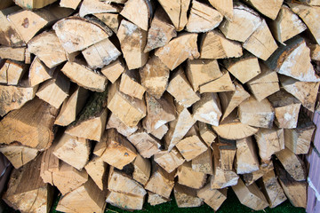 Texture of the firewood. Stacked woodpile.