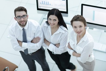 successful business team standing near workplace