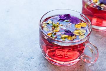 Red Herbal Tea with Edible Flowers.