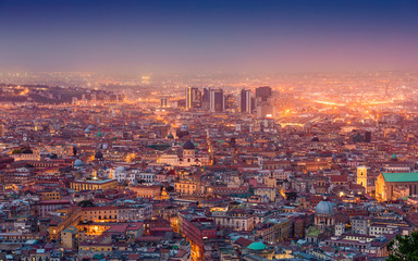 Aerial night view of glowing streets of Naples, Italy
