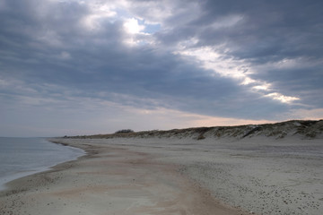 Fototapeta na wymiar Morning beach meditation with clouds