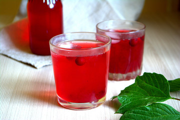 Cranberry juice or lemonade. Red refreshing drink