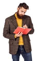 man with a pen and schedule book or diary in hand. human emotion expression and office, business, finances concept. image isolated white background.