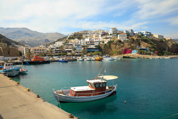 Fototapeta na wymiar The boats in Agia Galini, Crete.