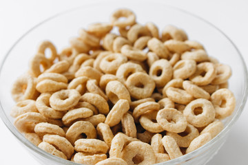 Pile of crispy cracknels in bowl , food background