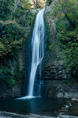 Fototapeta na wymiar powerful waterfall in the national park of Georgia