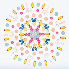 Assortment of various colourful pills on white background.  Creative medication and prescription pills flat lay background.