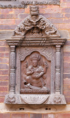 Kartikeya god - ancient wooden carving at the palace in Patan, Kathmandu valley, Nepal