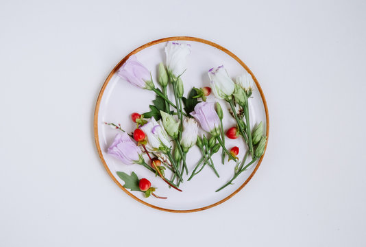 Lovely bouquet flower in ice cream cone on white background. Floral arrangement, flat lay styling. Top view.