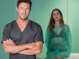 Young surgeon in operatory room.