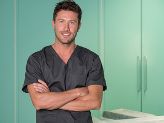 Young surgeon in operatory room.