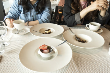 Cafe table with cake and desserts. Tea time and coffee time concept.