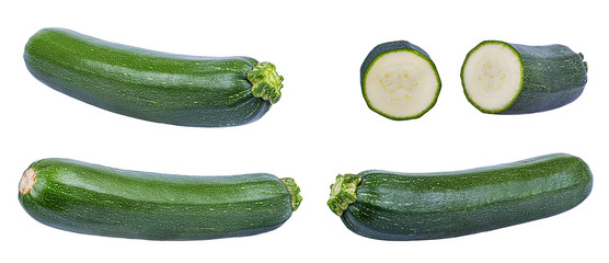 Fresh green zucchin with leaf and flower isolated on white background with clipping path