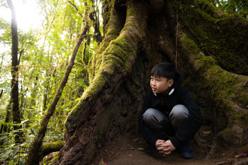 Young boy travel in a nature