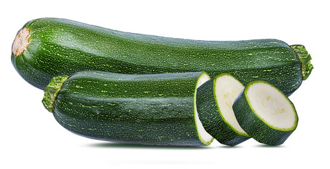 Fresh green zucchin with leaf and flower isolated on white background with clipping path