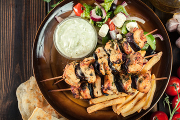 Chicken Souvlaki with french fries and tzatziki sauce