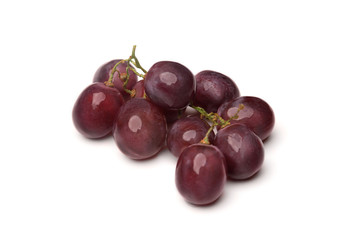 Bunch of red grapes isolated on white background