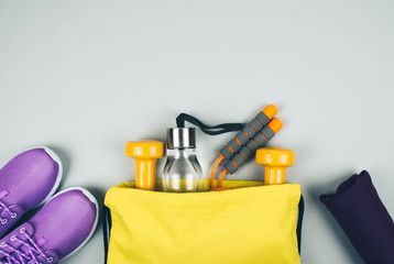 Creative flat lay of sport and fitness equipments