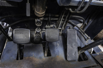 Old foot pedals in a car