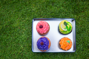 Naklejka premium Delicious, beautiful cakes in a box. Picnic at bachelorette hen party