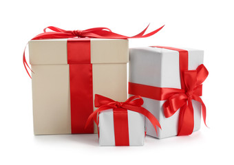 Beautifully decorated gift boxes on white background