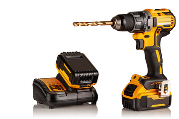 Obraz premium cordless drill, screwdriver, and battery charger