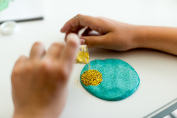 Adding Glittersparkles in home made slime