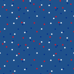 Seamless pattern background with stars in USA flag colors, suitable for national american holidays design.