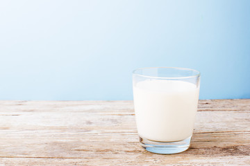 glass of milk on a light table