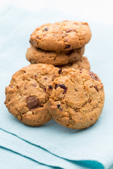 Chocolate oatmeal cookies on the  wooden background.