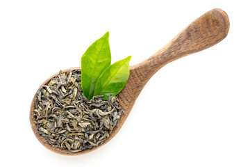 Green tea leaf the spoon isolated on white background.