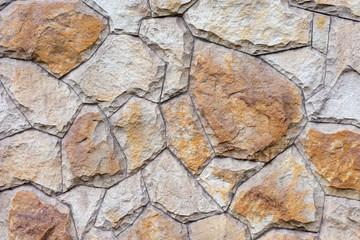 Wall of natural stone as texture