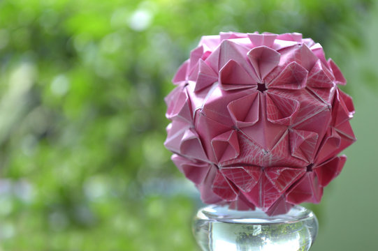 Modular origami, cherry blossom, on natural background